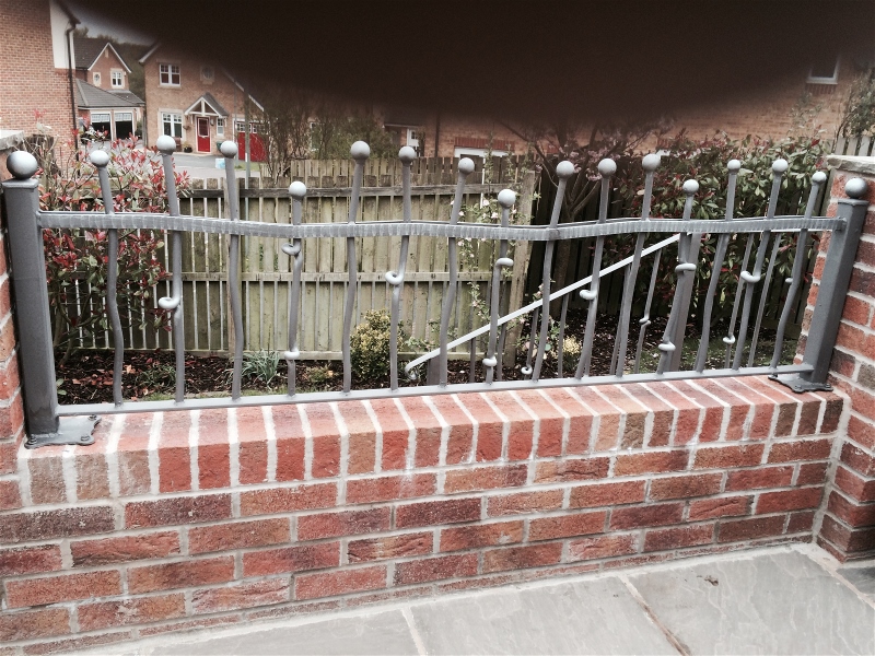 quality wrought iron railings on wall